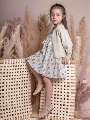 Belati kids spring summer flared dress with elasticated straps and big frill.