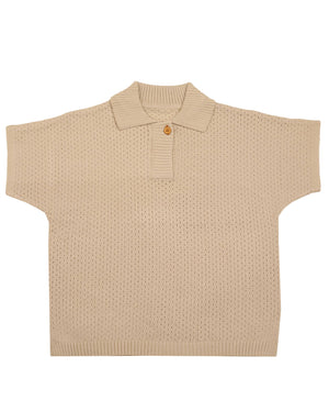 Belati kids boxy pointelle knit shirt with single button closure for boys and girls in beige.